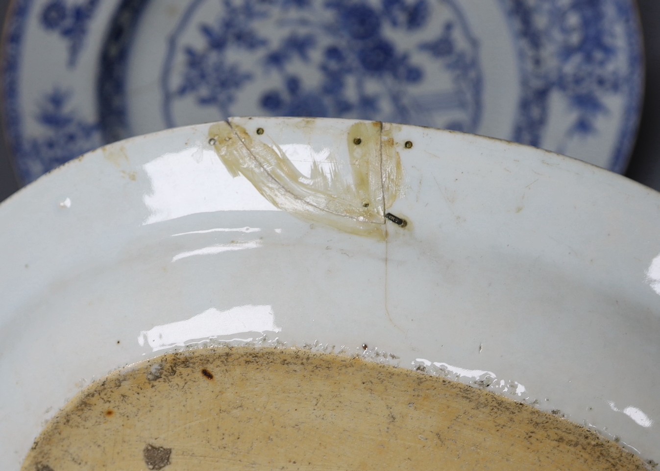 Three Chinese export blue and white dishes, 18th/19th century, largest 42cms wide
